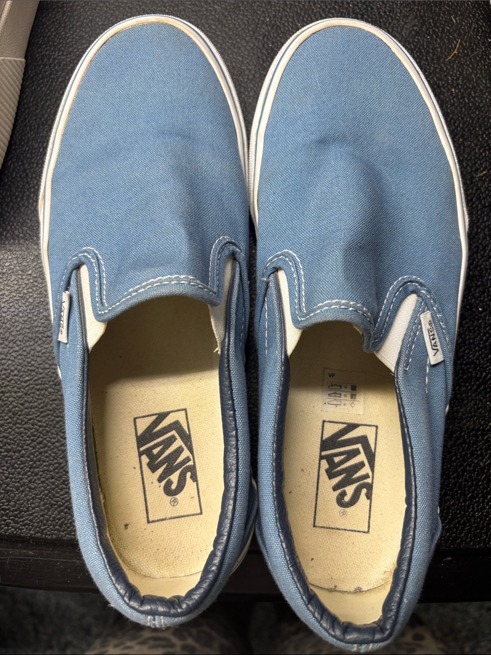 Vans Wonens Slip-On Sneakers in Light Blue Canvas